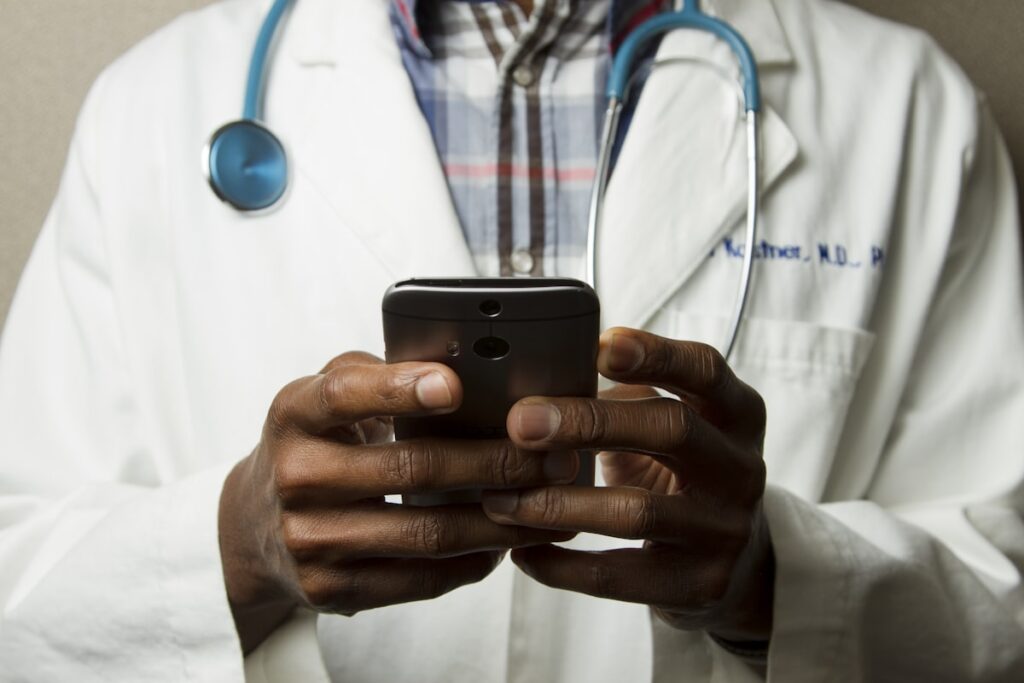 Doctor reviewing medical reports for free specialist opinion